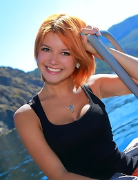 Violla delivers tempting poses in front of the camera and evokes a striking feminine radiance and elegant composure outdoors.